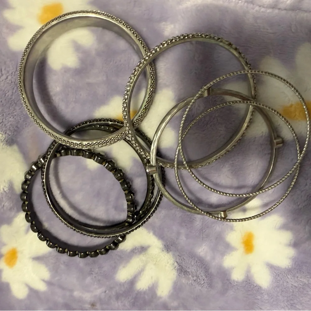 Stylish Silver and Black Bangle Set
You get all for one low price - Picture 9 of 12